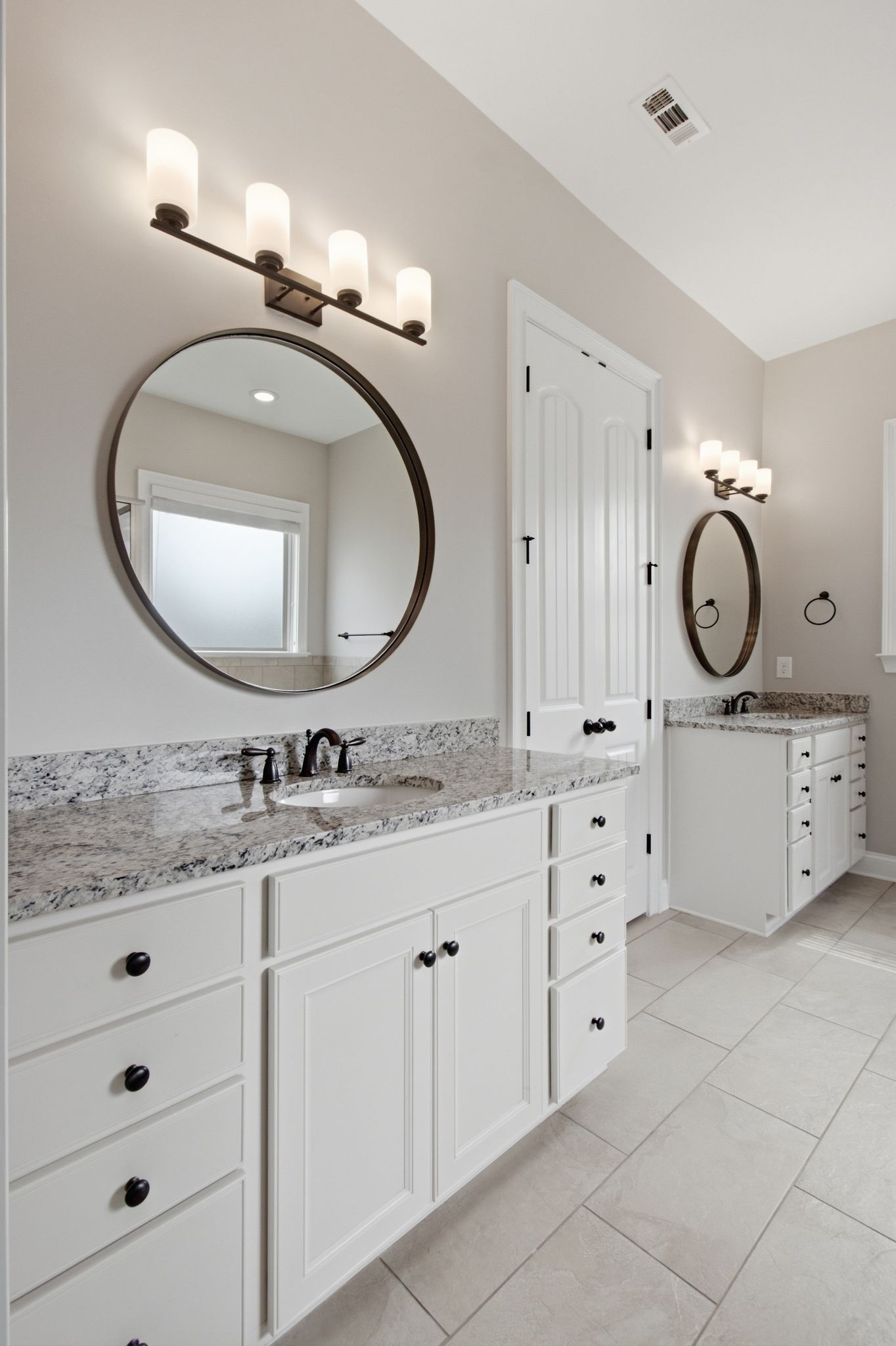 2720 Pool Forge Bridge Road Thompson's Station, TN 37179 - Photo 28 of 44 a bathroom with a granite countertop sink and mirror