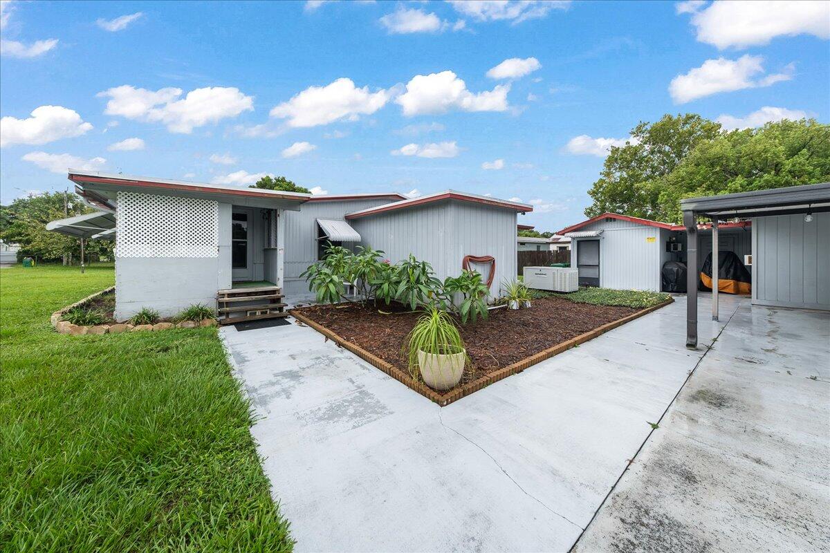 1985 Robi Circle Titusville, FL 32796 - Photo 1 of 24 Front of Home
