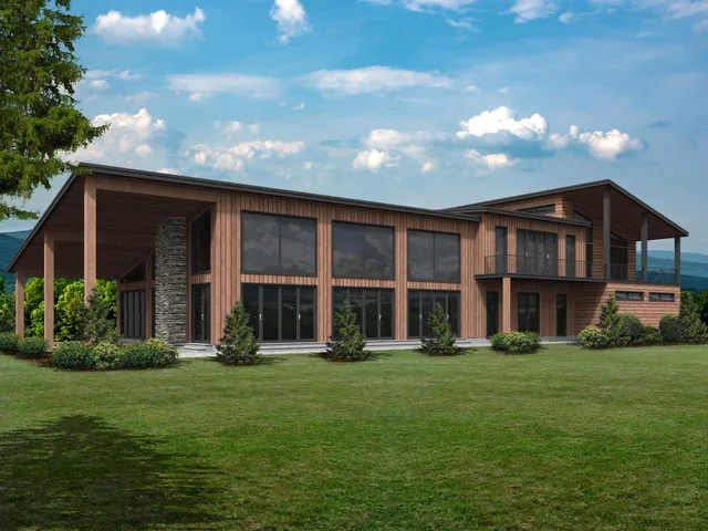 a front view of house with yard and green space