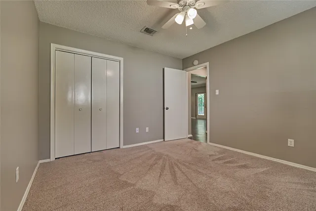 an empty room with a bathroom