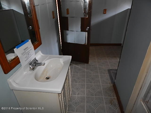3 Rr Hop Bottom, PA 18824 - Photo 8 of 13 a bathroom with a sink and toilet
