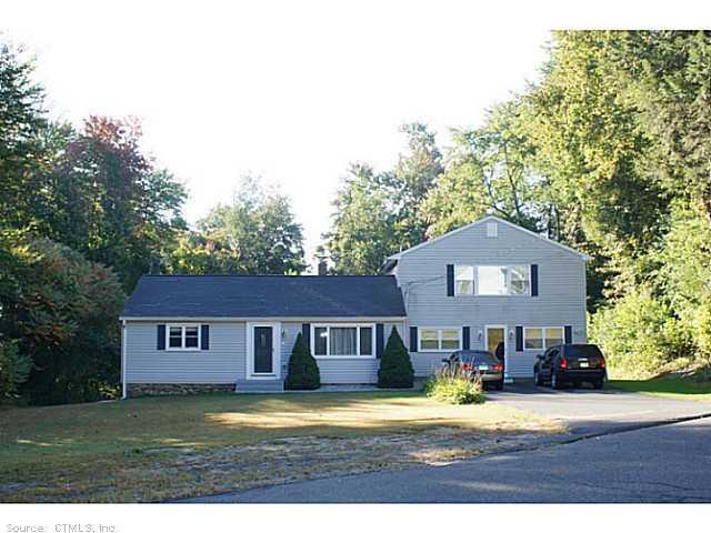 13 Chasse Road Wolcott, CT 06716 - Photo 1 of 1 a front view of a house with a yard