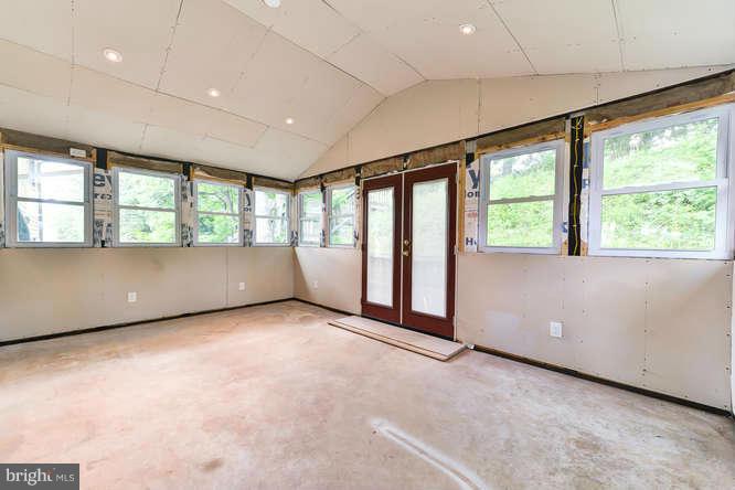 5918 Atteentee Road Springfield, VA 22150 - Photo 22 of 25 a view of an empty room with a window