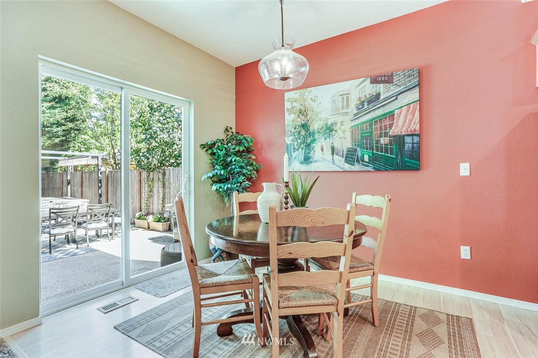 4331 147th Place Southeast Bothell, WA 98012 - Photo 14 of 33 a view of a dining room with furniture window and outside view