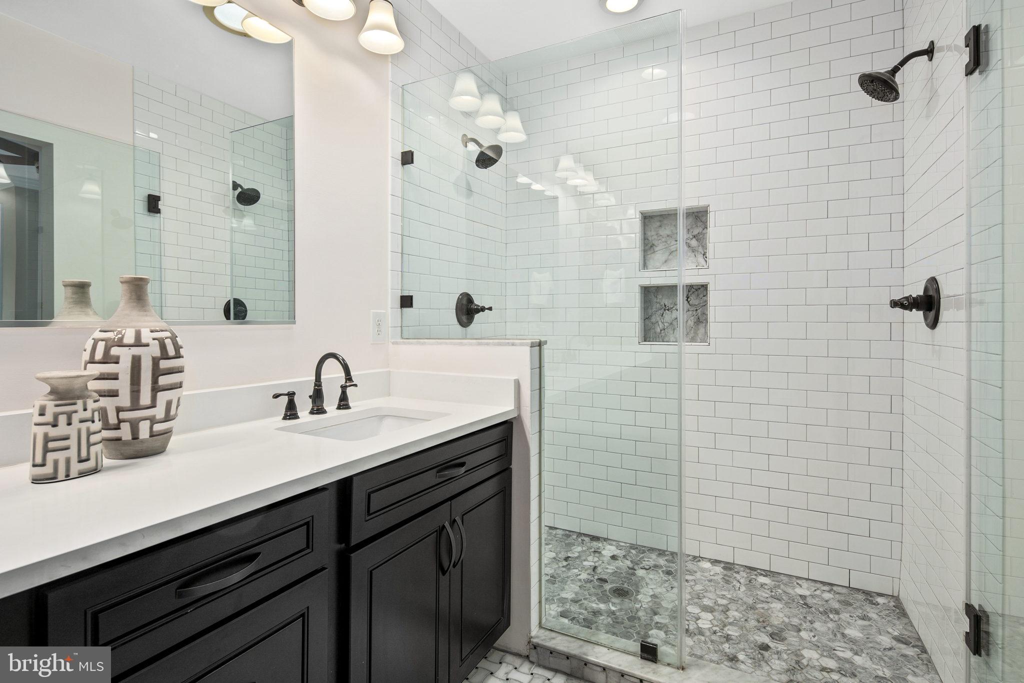 650 G Street Northeast Washington, DC 20002 - Photo 19 of 49 Beautiful shower w/ glass shower enclosure