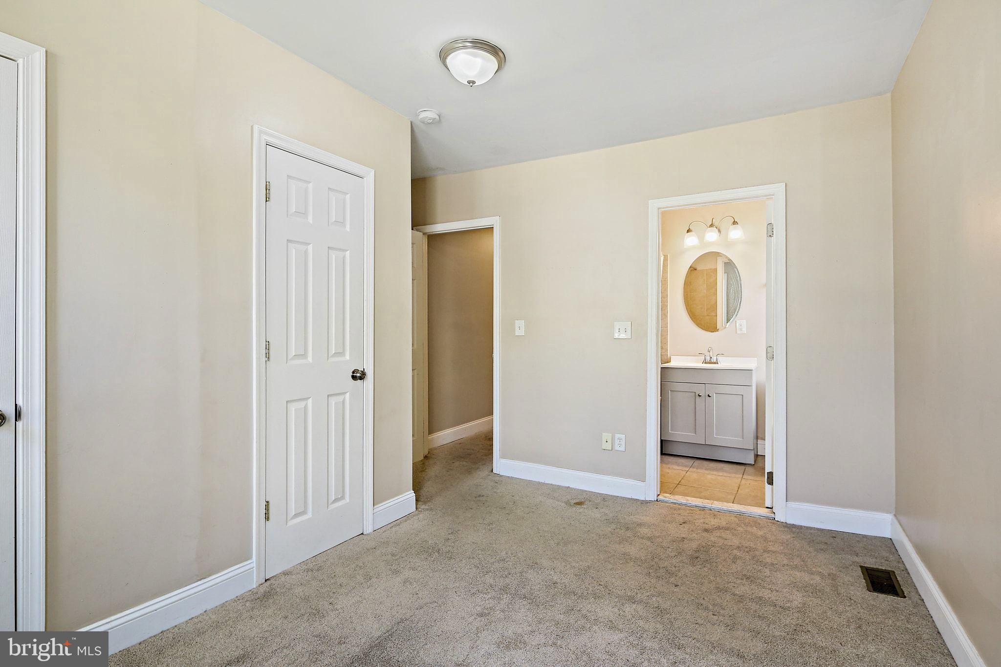 211 North Streeper Street Baltimore, MD 21224 - Photo 16 of 33 a view of a storage & utility room with washer and dryer