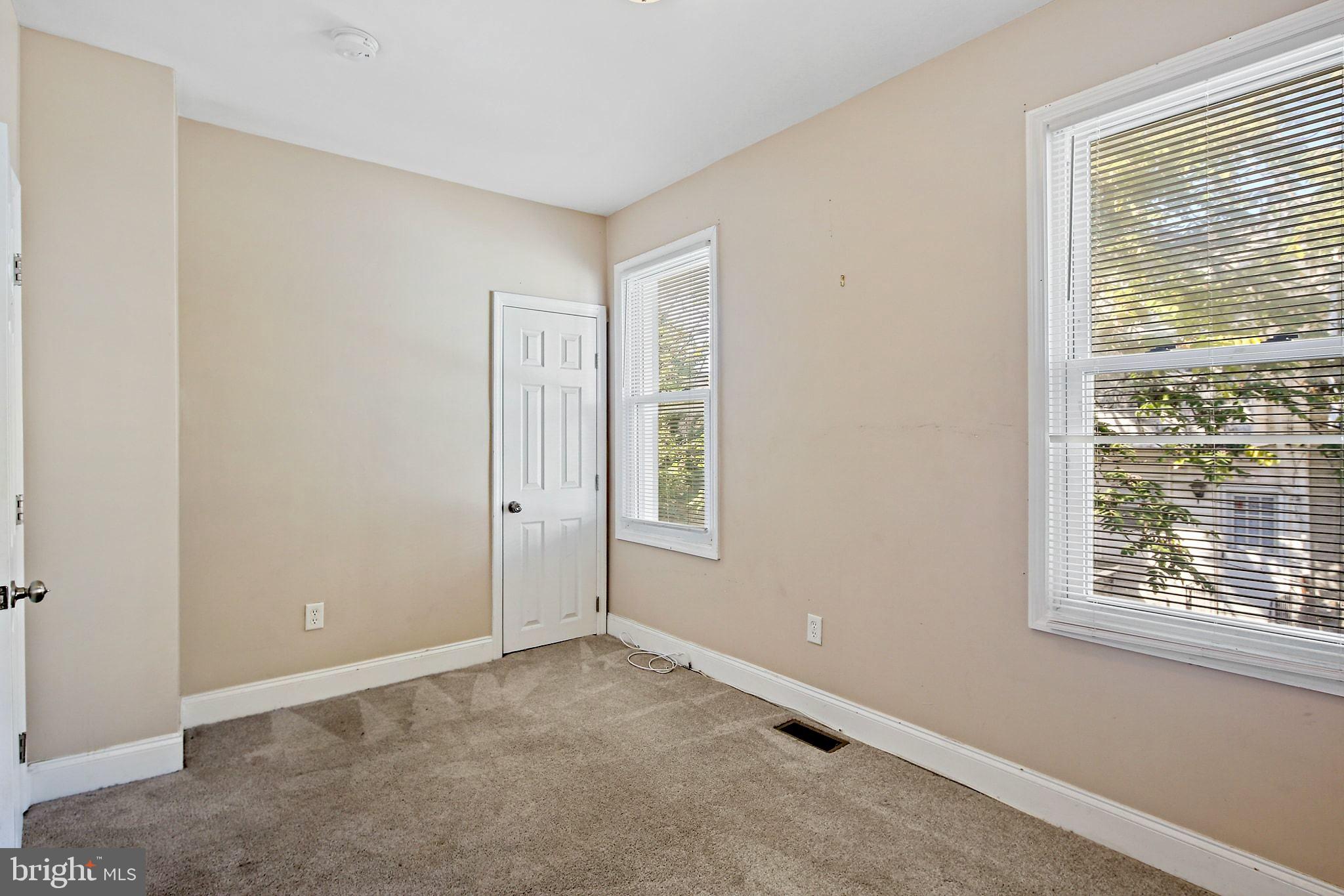 211 North Streeper Street Baltimore, MD 21224 - Photo 21 of 33 a view of an empty room with a window