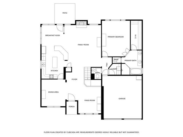 an aerial view of a house with a yard basket ball court and outdoor seating