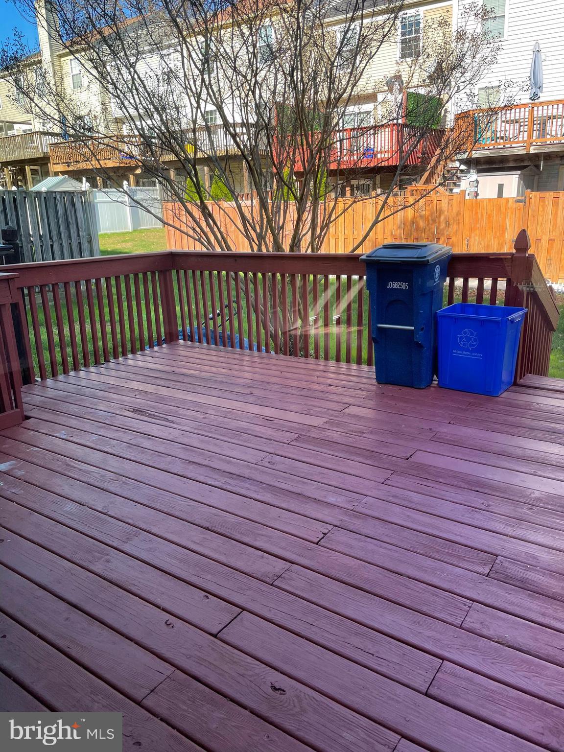 12405 Gooderham Way Gaithersburg, MD 20878 - Photo 30 of 31 a view of a house with a wooden deck