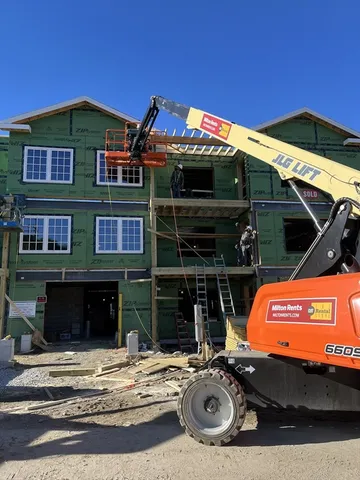 a view of a house with backyard