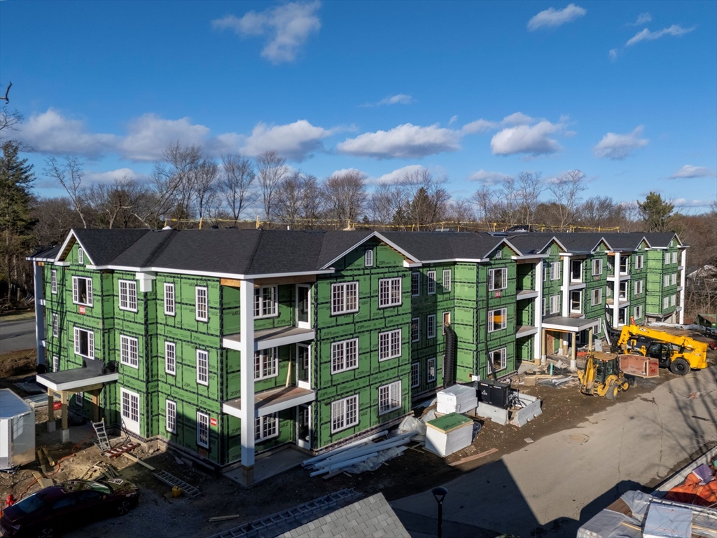 93 Bedford Street, Unit 201 Lexington, MA 02420 - Photo 5 of 7 a view of a city from a dining room with furniture
