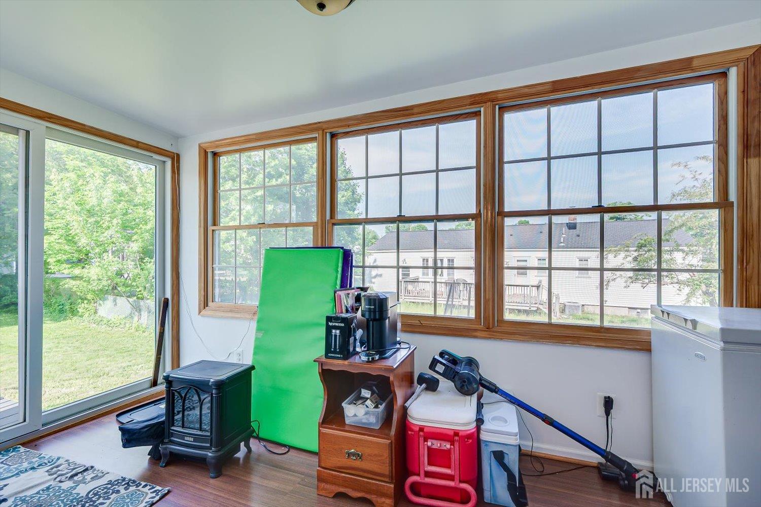 12 Gales Road Edison, NJ 08837 - Photo 11 of 35 a living room with furniture and large windows