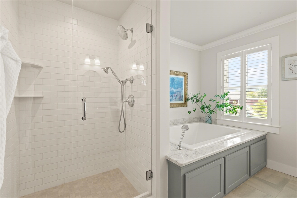 14 Parkview Road, Unit 14 Franklin, MA 02038 - Photo 28 of 42 a bathroom with a tub sink and mirror