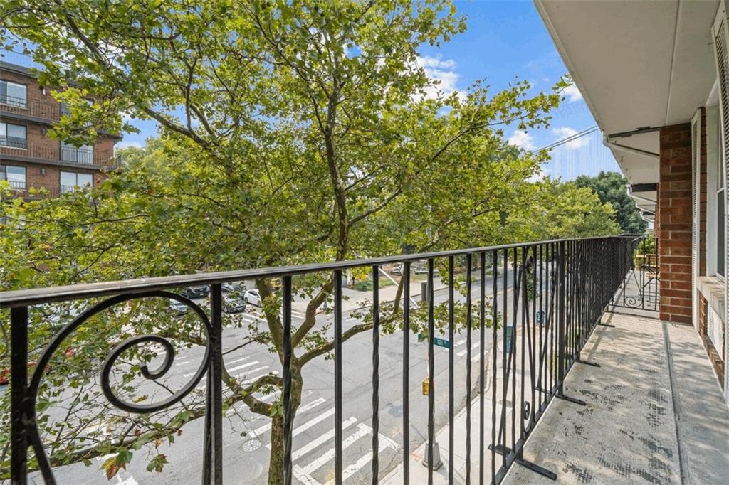 101-06 4th Avenue, Unit 26E Brooklyn, NY 11209 - Photo 7 of 16 a balcony with street view
