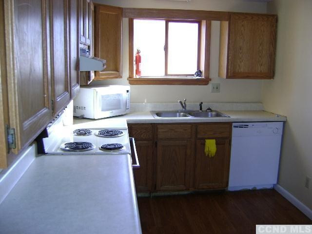 25 Helsley Road Germantown, NY 12526 - Photo 2 of 7 a kitchen with sink cabinets and window