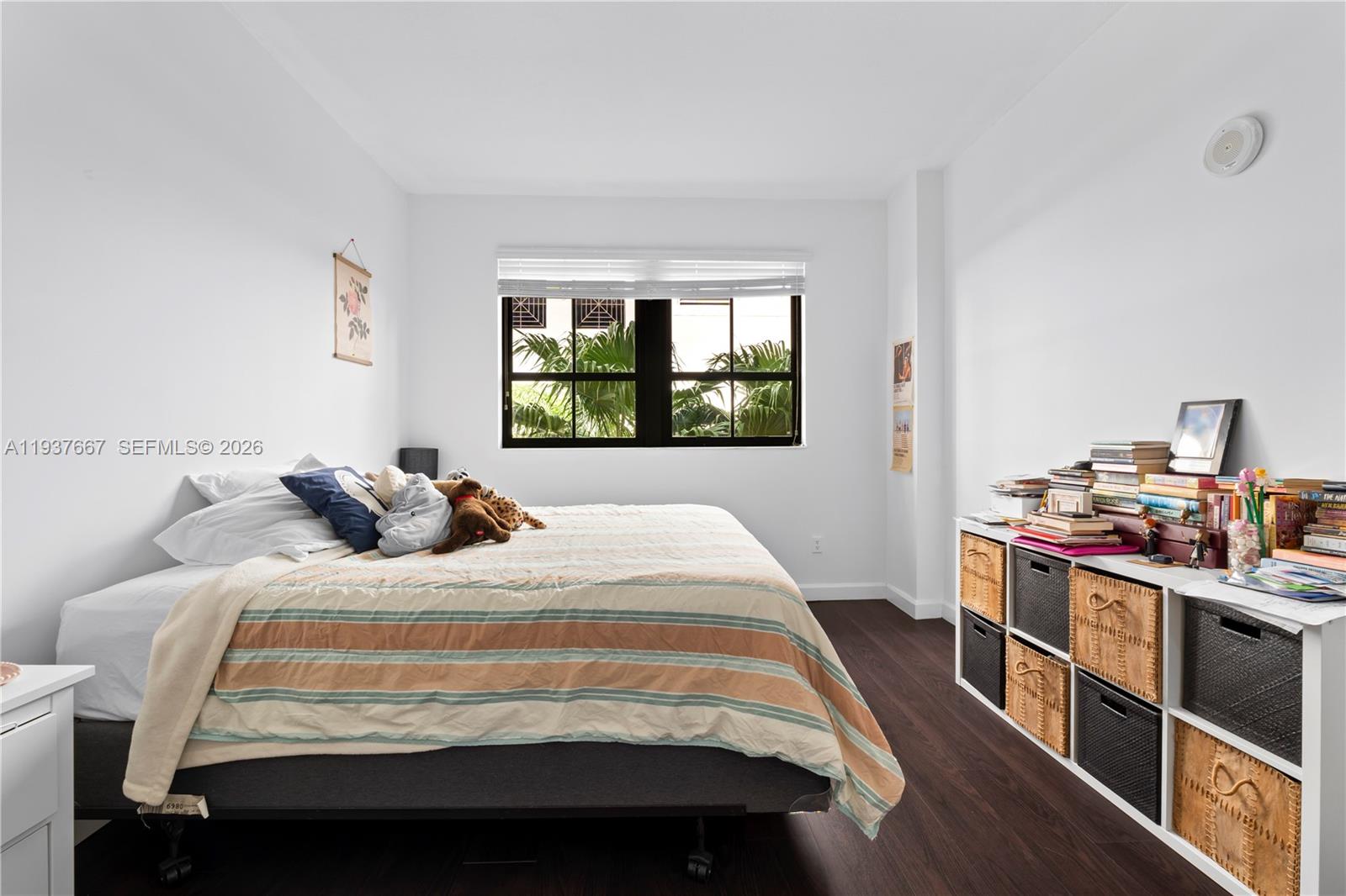 8395 Southwest 73rd Avenue, Unit 115 Miami, FL 33143 - Photo 21 of 26 a bed room with a bed and a window