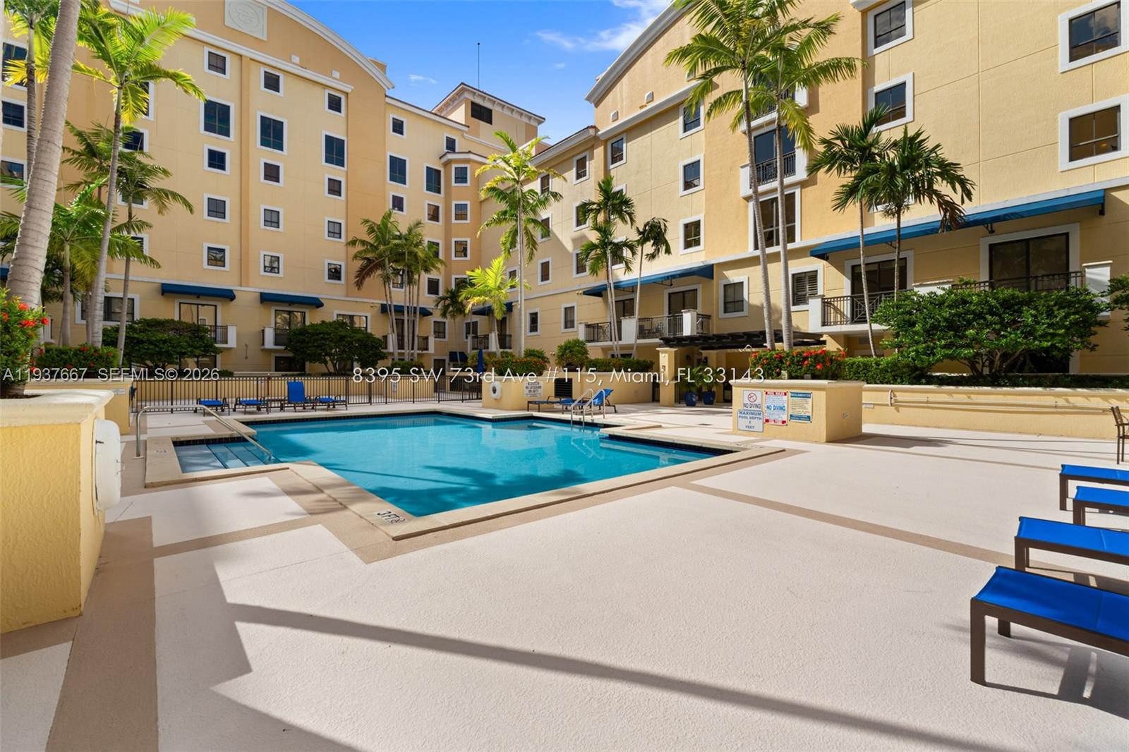 8395 Southwest 73rd Avenue, Unit 115 Miami, FL 33143 - Photo 24 of 26 a view of building with yard