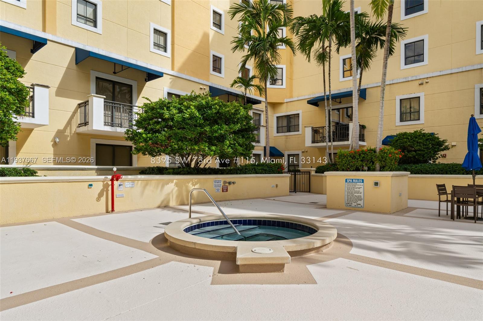 8395 Southwest 73rd Avenue, Unit 115 Miami, FL 33143 - Photo 25 of 26 a view of a swimming pool with a patio