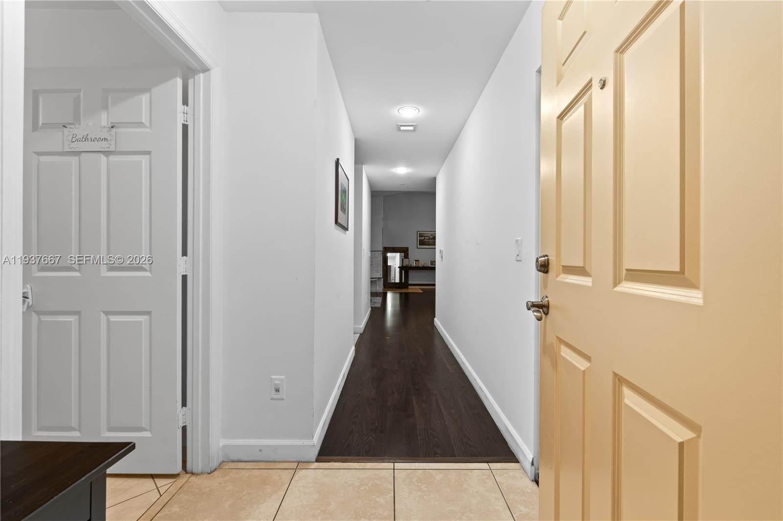 8395 Southwest 73rd Avenue, Unit 115 Miami, FL 33143 - Photo 5 of 26 a view of a hallway with windows