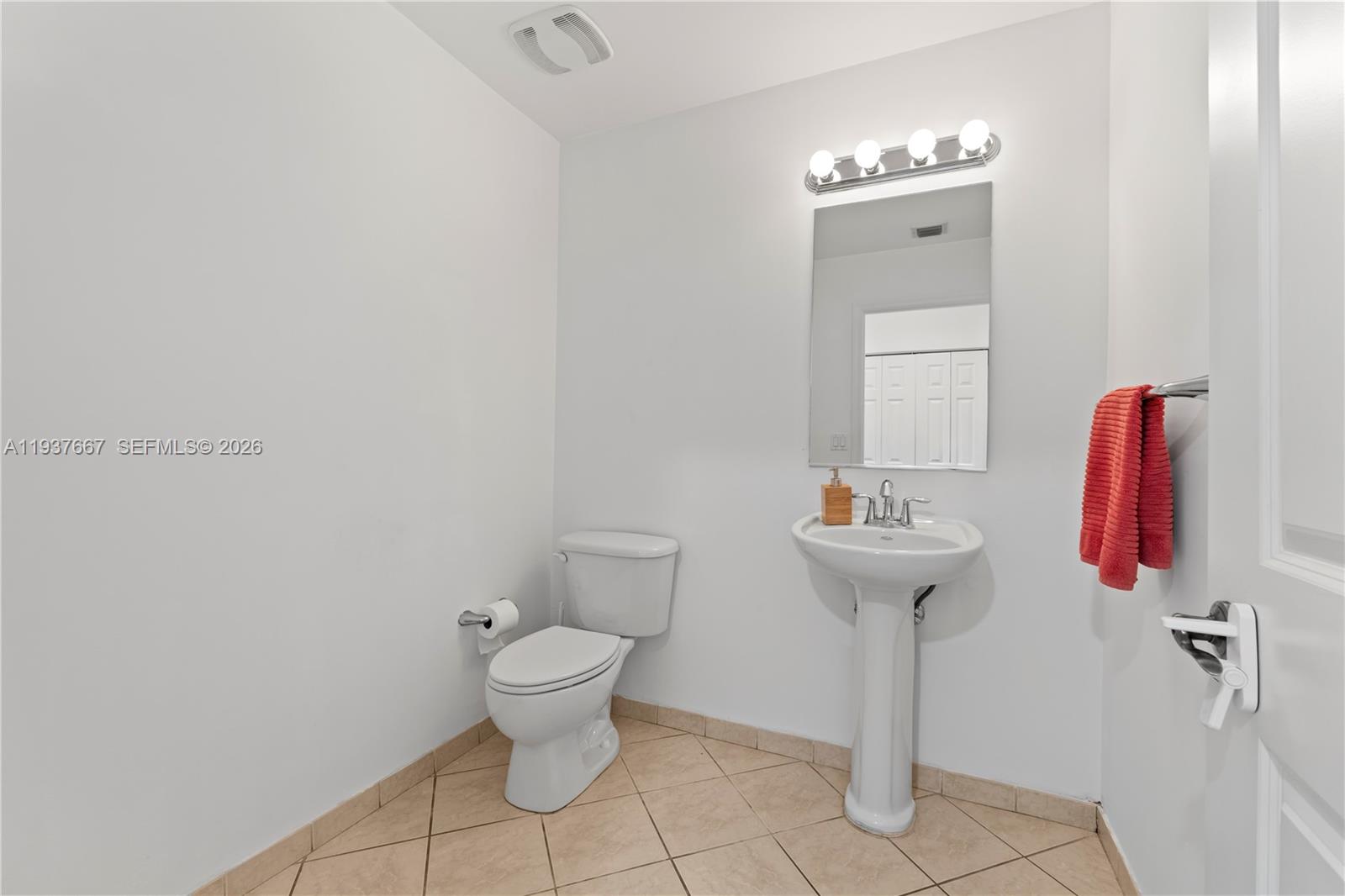 8395 Southwest 73rd Avenue, Unit 115 Miami, FL 33143 - Photo 6 of 26 a bathroom with a sink and toilet