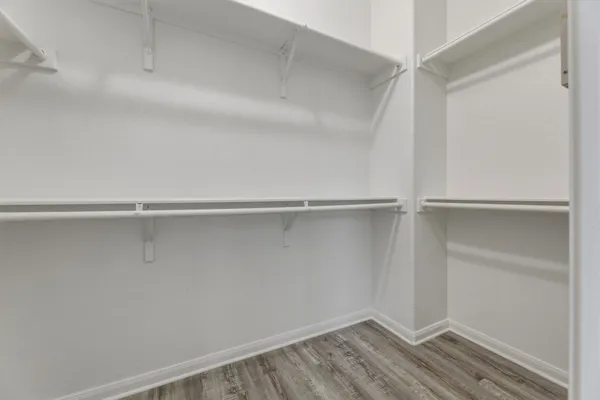 a view of an empty walk in closet
