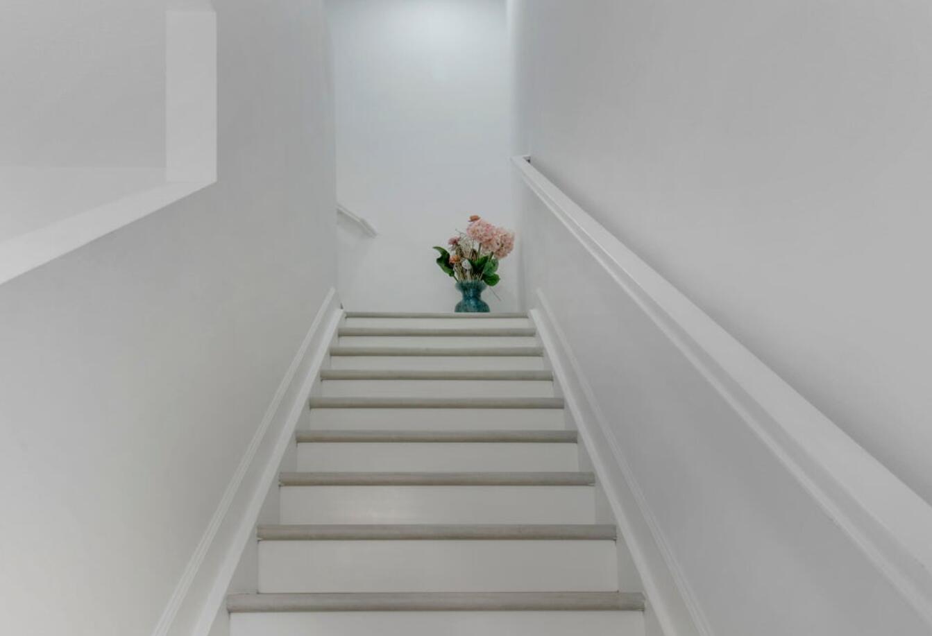 1010 Willow Place Riviera Beach, FL 33410 - Photo 16 of 24 Stairway to Upstairs Bedrooms/Laundry