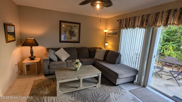 a bedroom with bed and a window