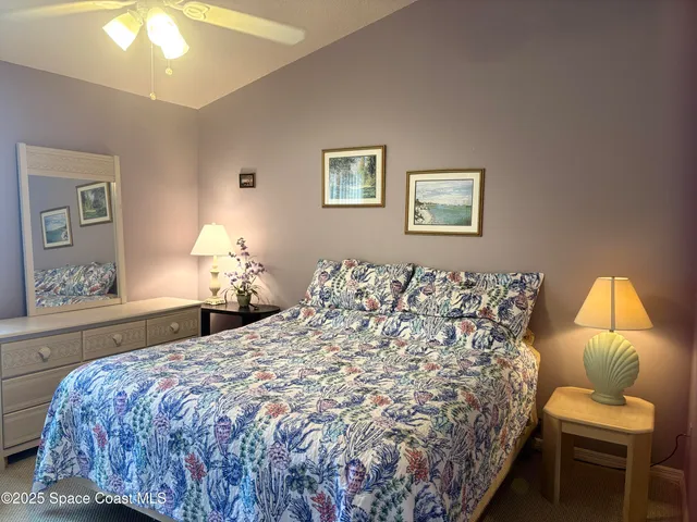 a view of backyard with seating area and green space