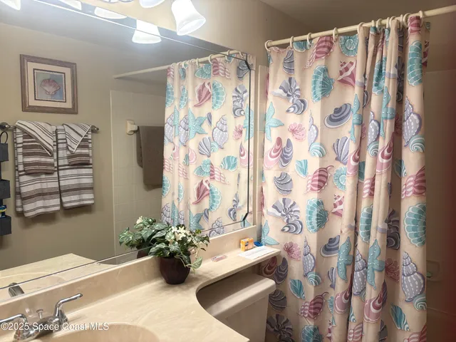 a view of a balcony with wooden floor