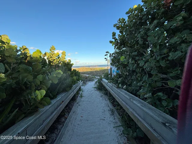 a view of a house with a swimming pool