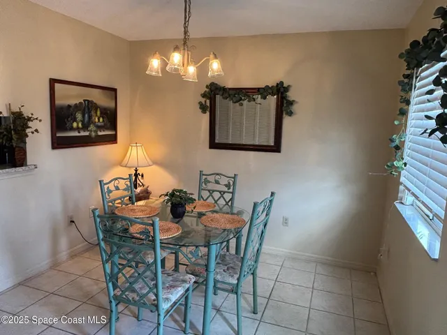 a view of a living room and kitchen