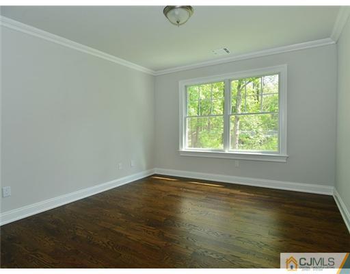 259 Mt Lucas Road Princeton, NJ 08540 - Photo 14 of 19 an empty room with wooden floor and windows