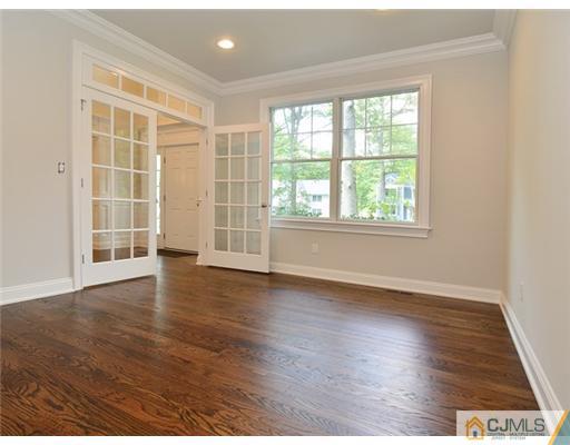 259 Mt Lucas Road Princeton, NJ 08540 - Photo 3 of 19 an empty room with wooden floor and windows