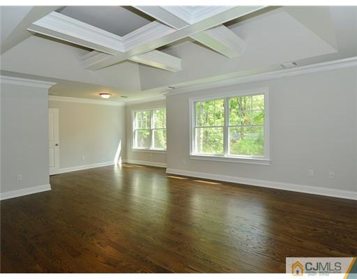259 Mt Lucas Road Princeton, NJ 08540 - Photo 8 of 19 an empty room with wooden floor and windows