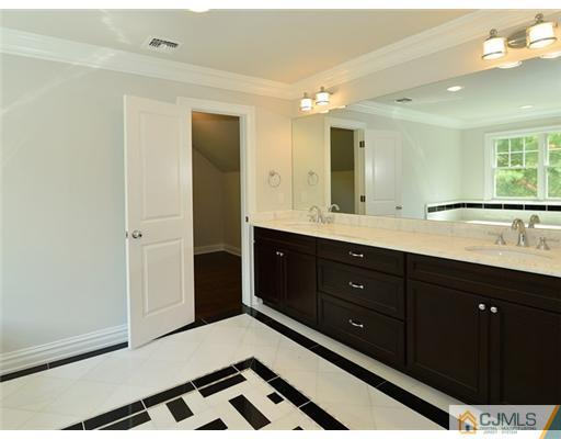 259 Mt Lucas Road Princeton, NJ 08540 - Photo 10 of 19 a spacious bathroom with a double vanity sink and a mirror