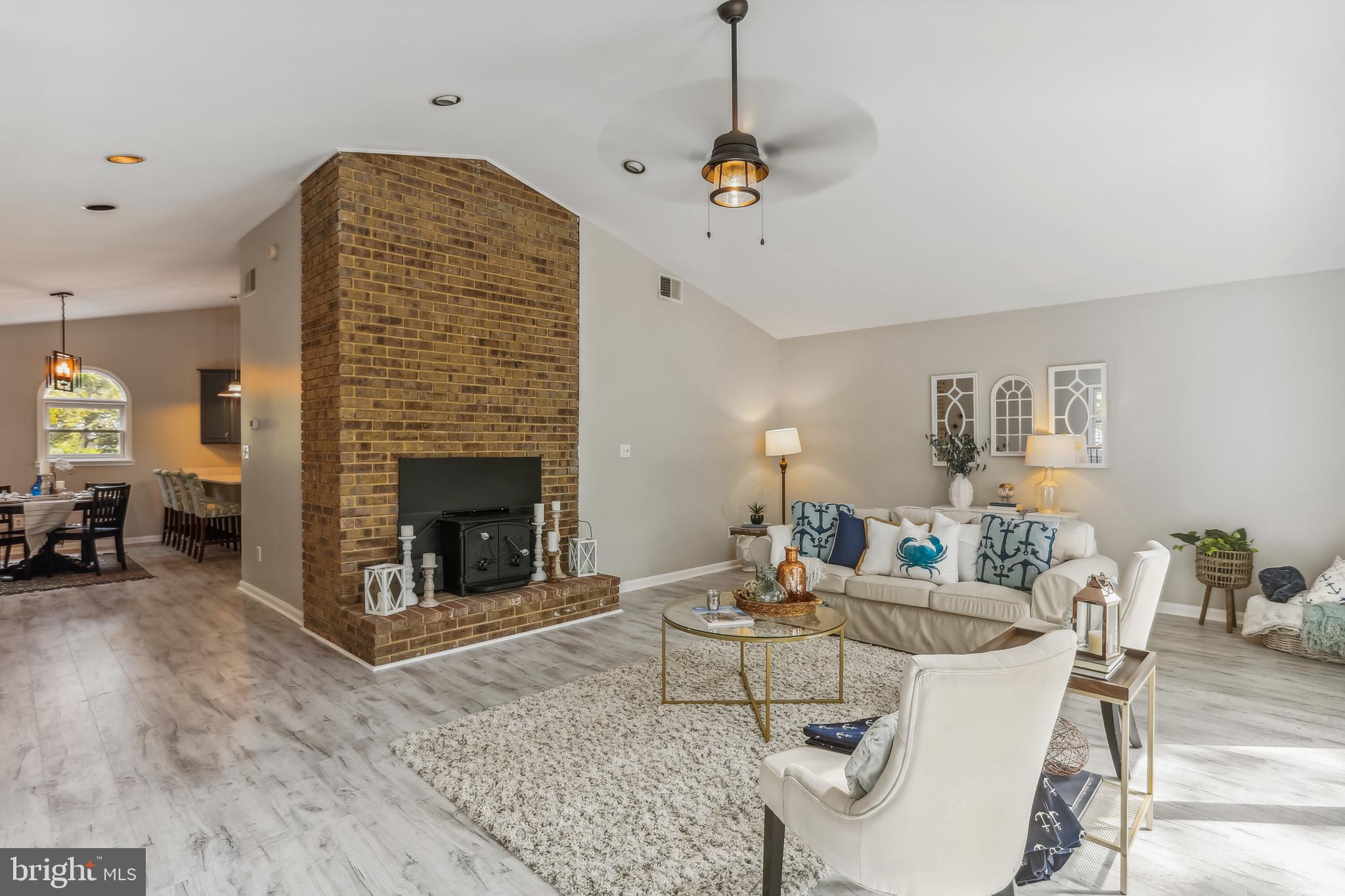 591 Riverside Drive Pasadena, MD 21122 - Photo 6 of 31 Family room with wood