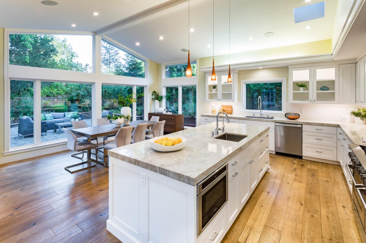 631 La Mesa Drive Portola Valley, CA 94028 - Photo 12 of 27 a kitchen with a stove windows and dining table