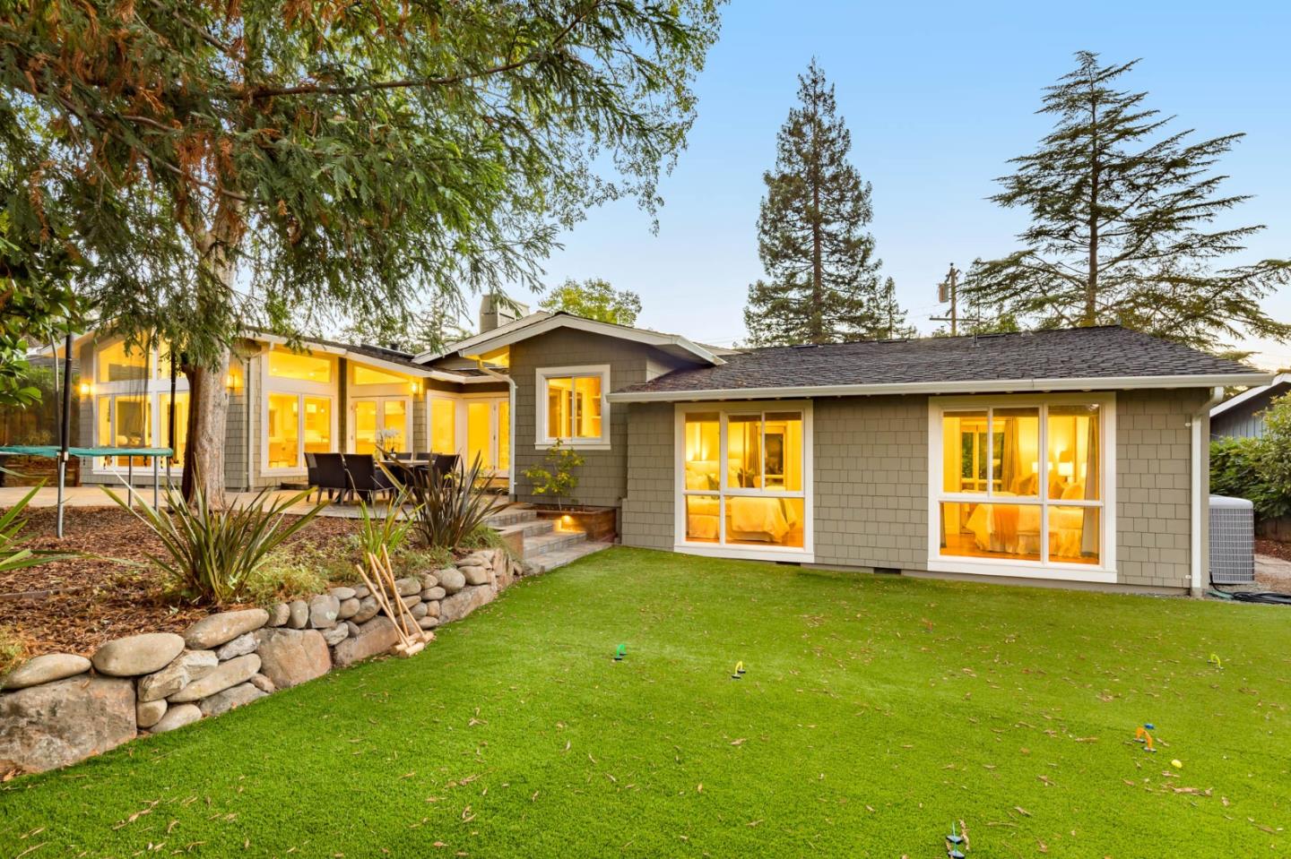 631 La Mesa Drive Portola Valley, CA 94028 - Photo 23 of 27 a front view of a house with a garden