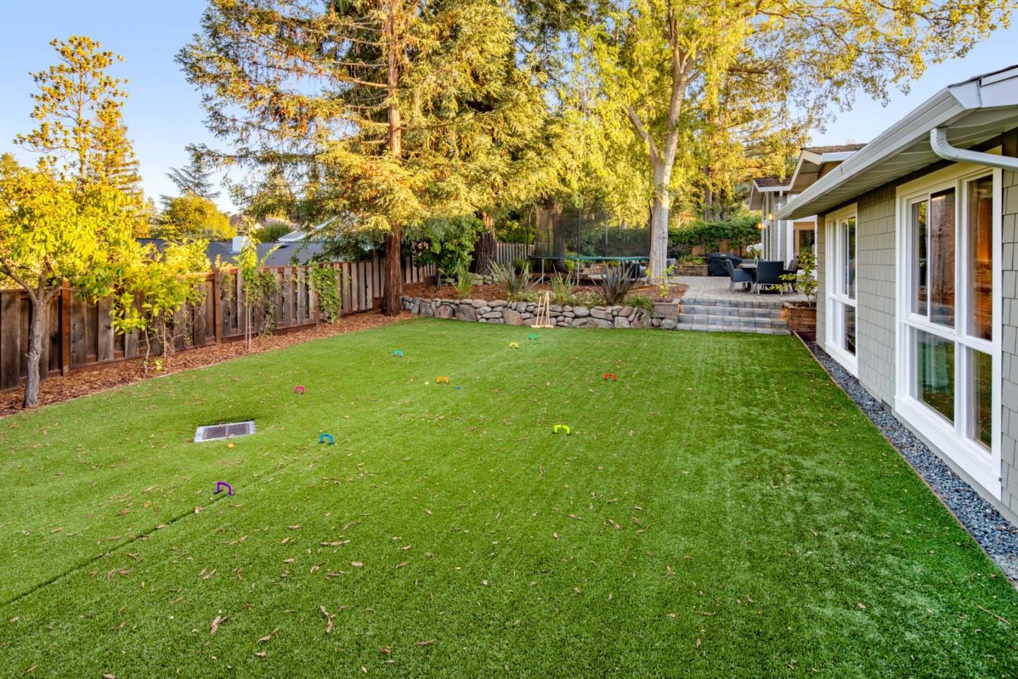 631 La Mesa Drive Portola Valley, CA 94028 - Photo 27 of 27 a view of yard with swimming pool and trees in the background