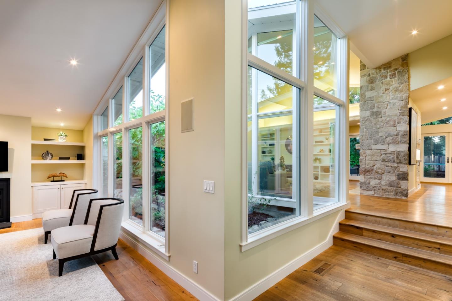 631 La Mesa Drive Portola Valley, CA 94028 - Photo 5 of 27 a view of an entryway with wooden floor and a floor to ceiling window