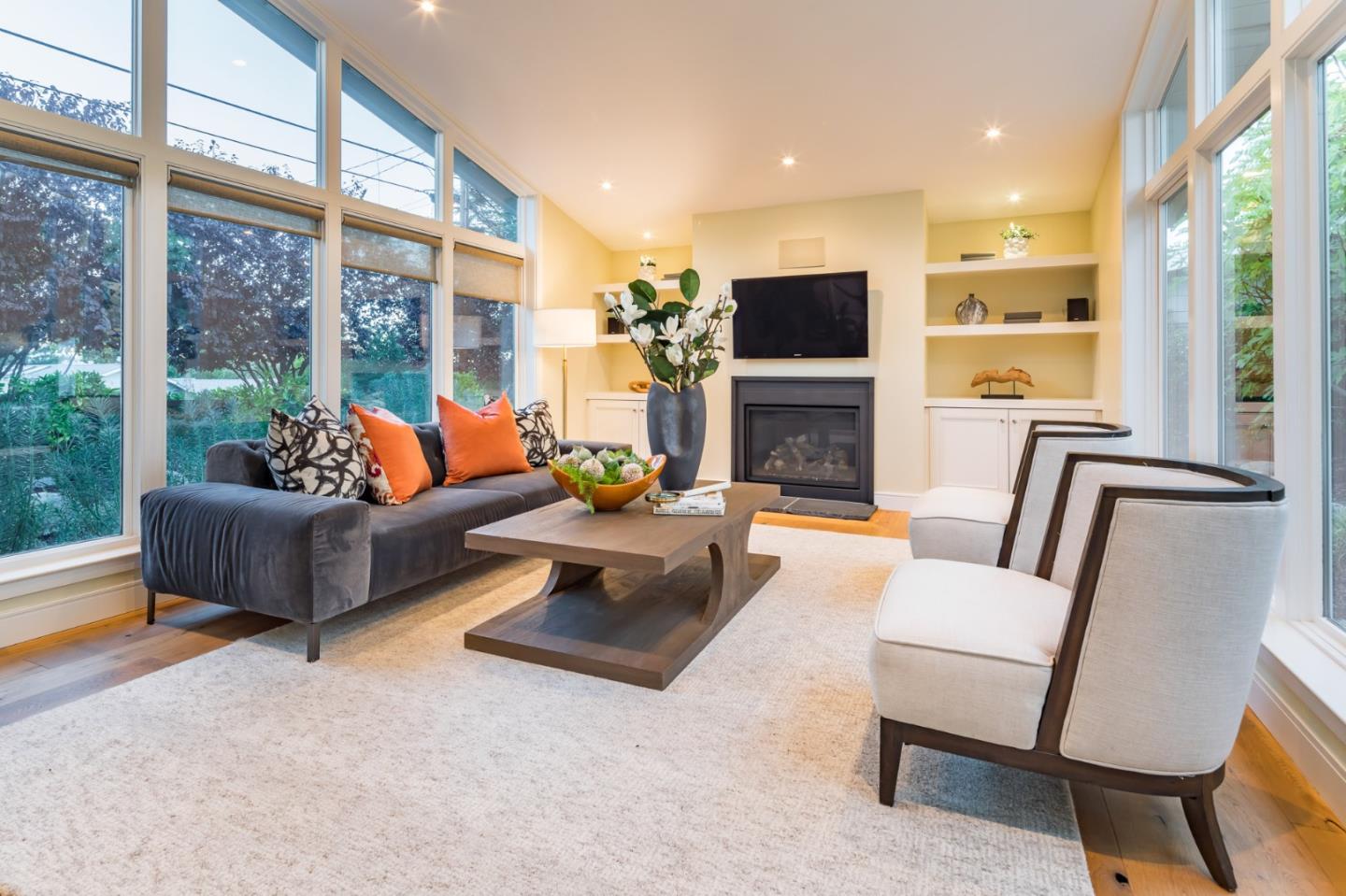 631 La Mesa Drive Portola Valley, CA 94028 - Photo 6 of 27 a living room with fireplace furniture and a flat screen tv