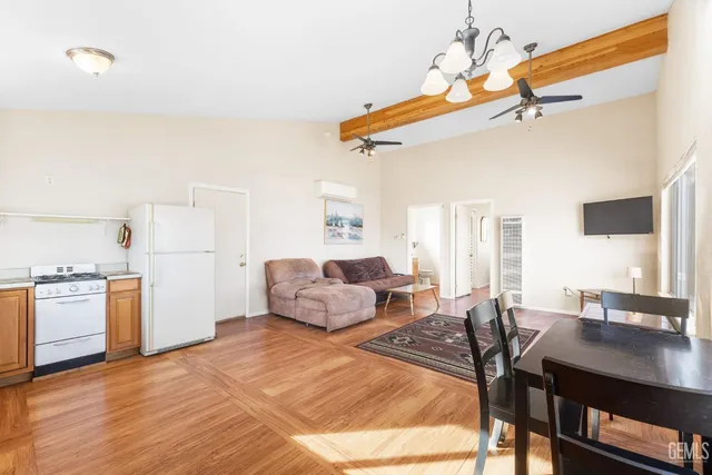 a bedroom with a bed and a window with outer view