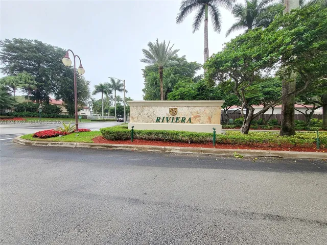 a view of street with houses