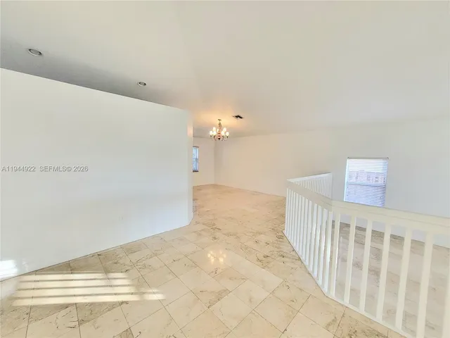 a view of a hallway with closet