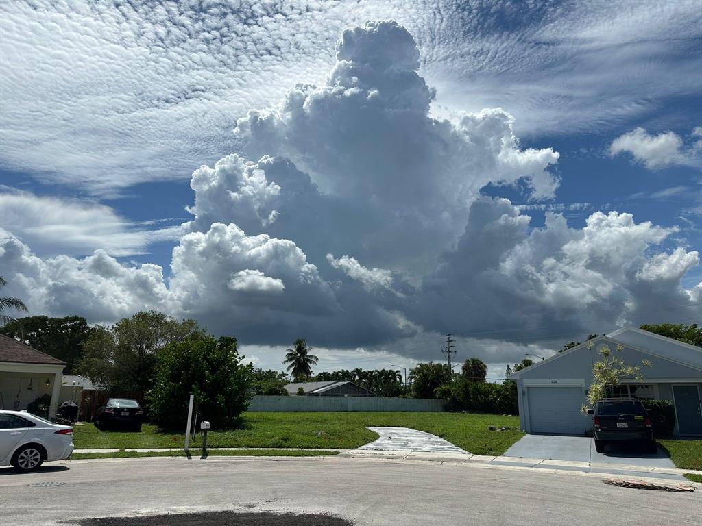 23228 Bentley Place Boca Raton, FL 33433 - Photo 6 of 6 a city view with lot of cars parked