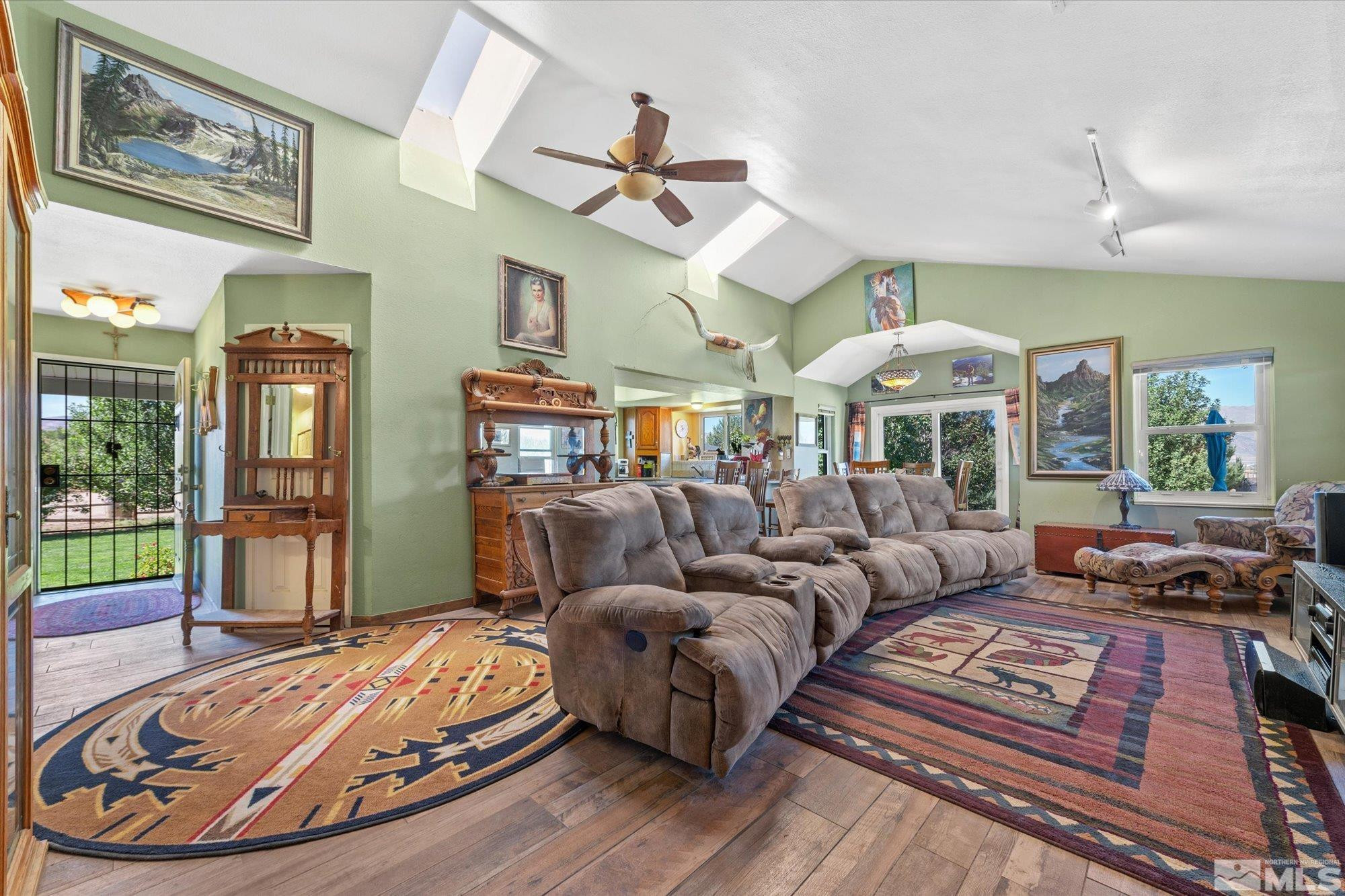 16300 Pyramid Way Reno, NV 89510 - Photo 14 of 36 a living room with furniture and a large window