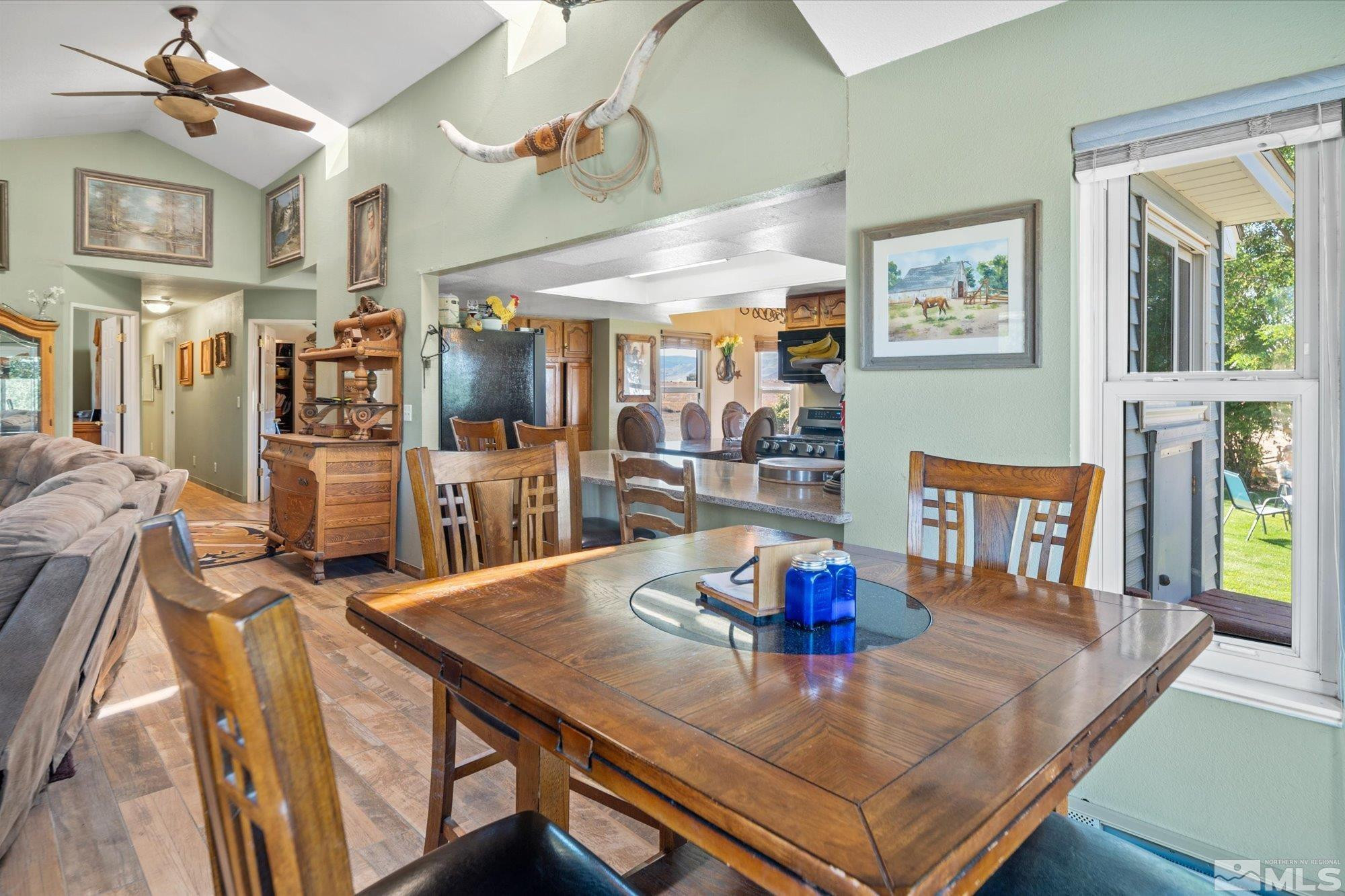 16300 Pyramid Way Reno, NV 89510 - Photo 18 of 36 a view of a dining room with furniture and a table