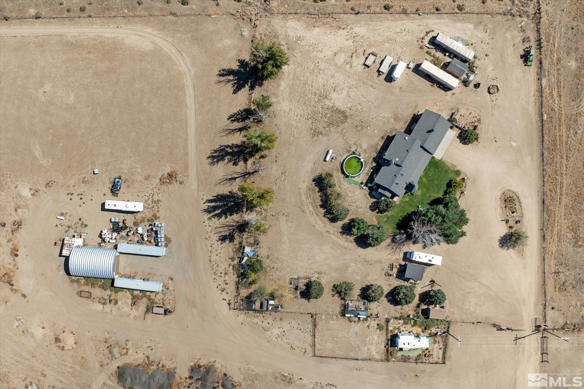 16300 Pyramid Way Reno, NV 89510 - Photo 31 of 36 an aerial view of a house with a table and chair