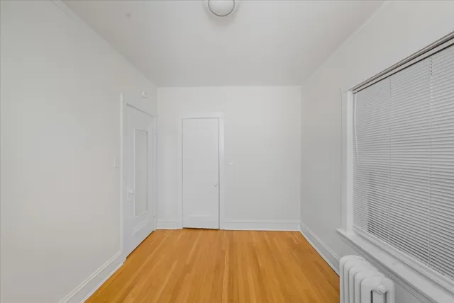 a view of a room with racks on the wall