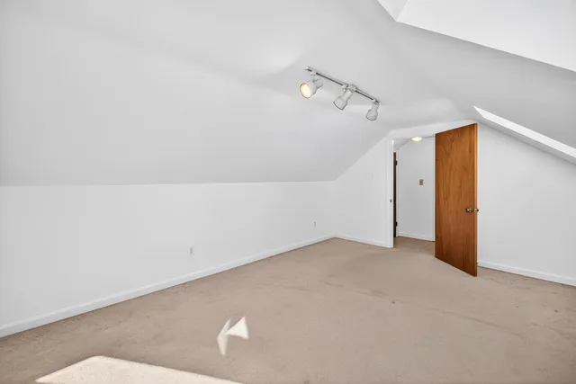 a view of a lake with a city from balcony